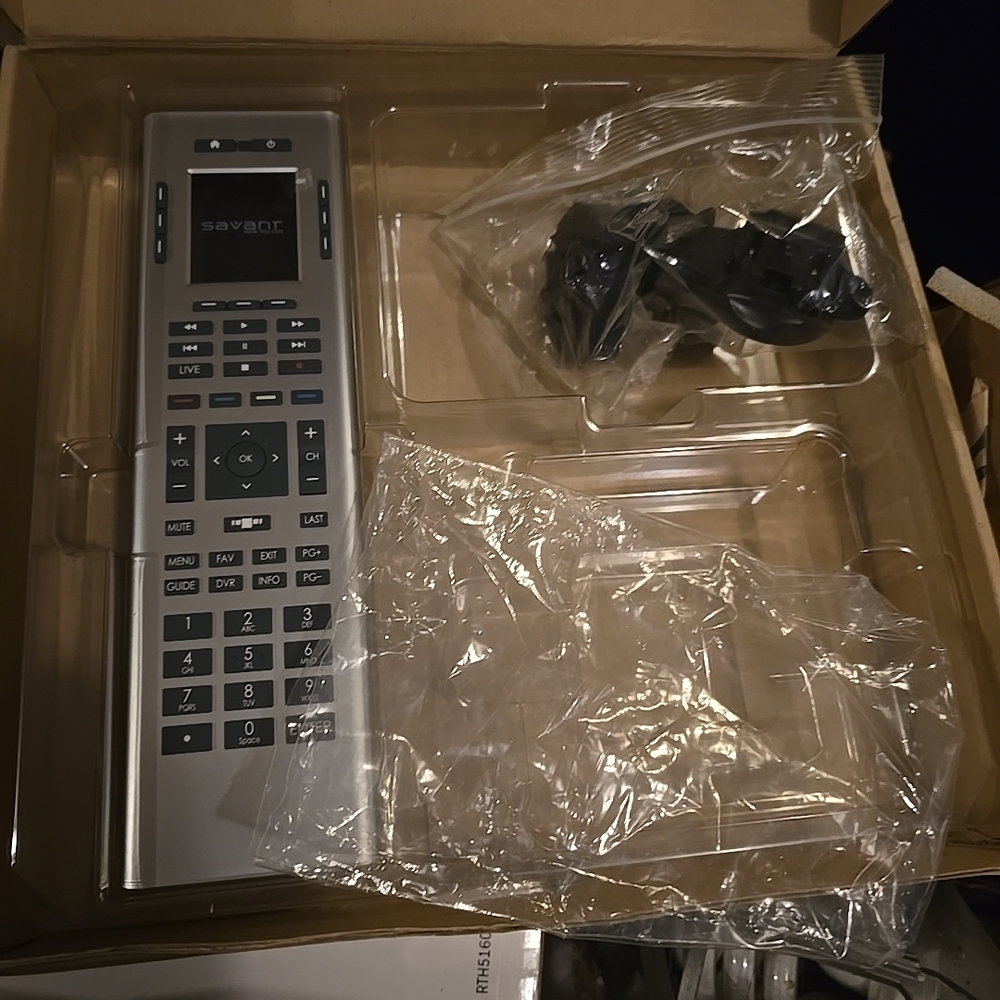 Genuine Savant SUR-0500 Remote Control. Missing Charging Dock